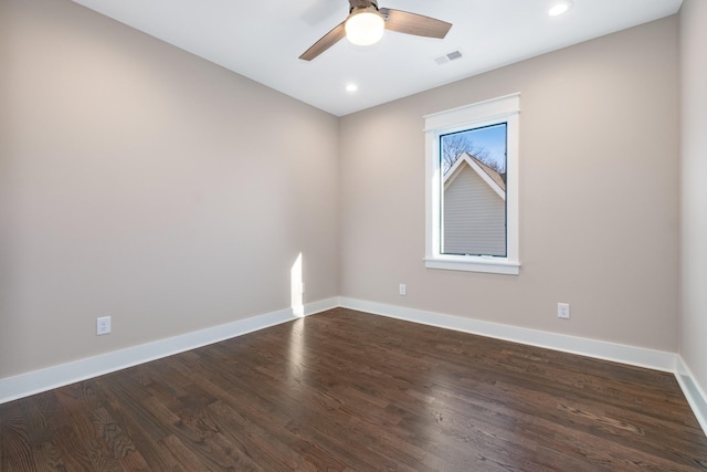 empty room with visible vents, baseboards, recessed lighting, dark wood-style floors, and a ceiling fan