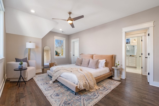 bedroom with wood finished floors, recessed lighting, arched walkways, baseboards, and ceiling fan