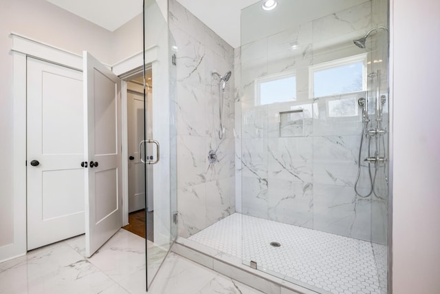 full bathroom with recessed lighting, marble finish floor, and a marble finish shower