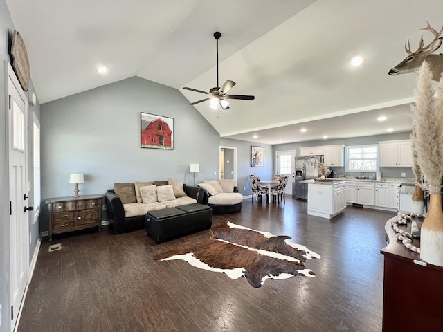 living area with dark wood-style floors, recessed lighting, baseboards, and ceiling fan