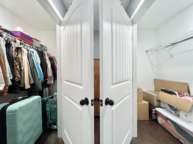 spacious closet with wood finished floors