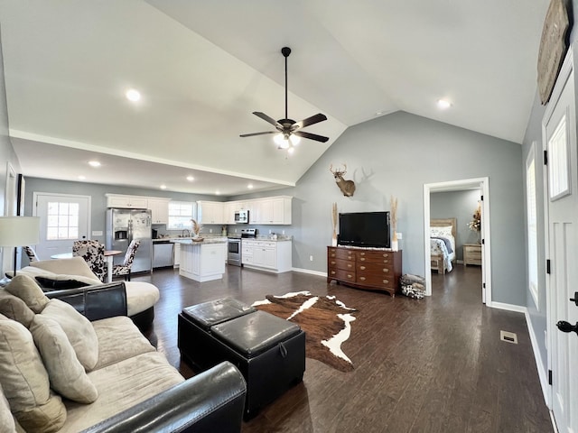 living area featuring visible vents, baseboards, ceiling fan, recessed lighting, and dark wood-style floors