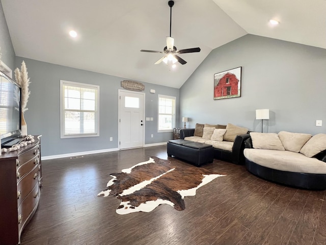 living room with dark wood-style floors, baseboards, lofted ceiling, and a ceiling fan