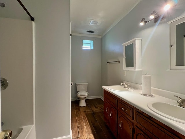 full bath with wood finished floors, visible vents, a sink, and toilet