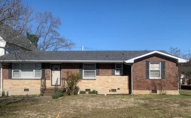 single story home with brick siding and crawl space