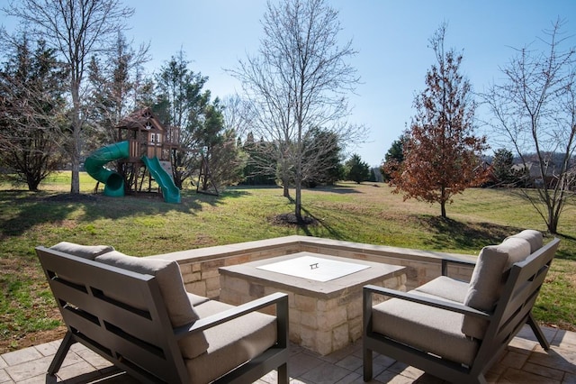 view of patio / terrace featuring an outdoor living space and a playground