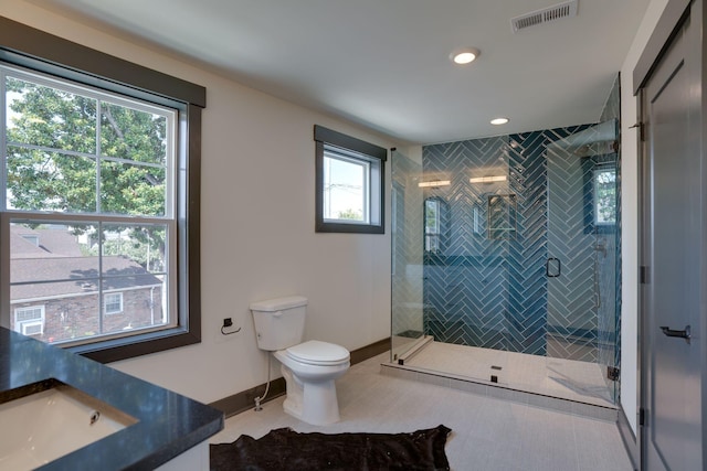 bathroom with visible vents, a shower stall, baseboards, toilet, and tile patterned floors