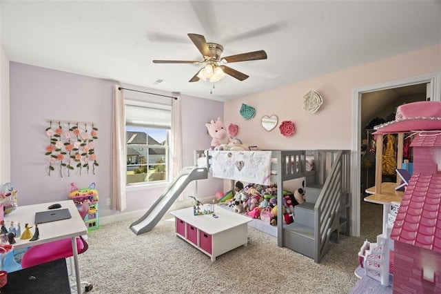 carpeted bedroom featuring visible vents and ceiling fan