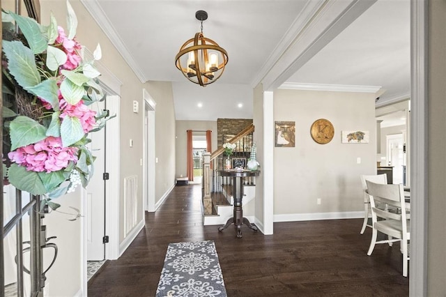 entryway featuring stairway, baseboards, wood finished floors, and crown molding