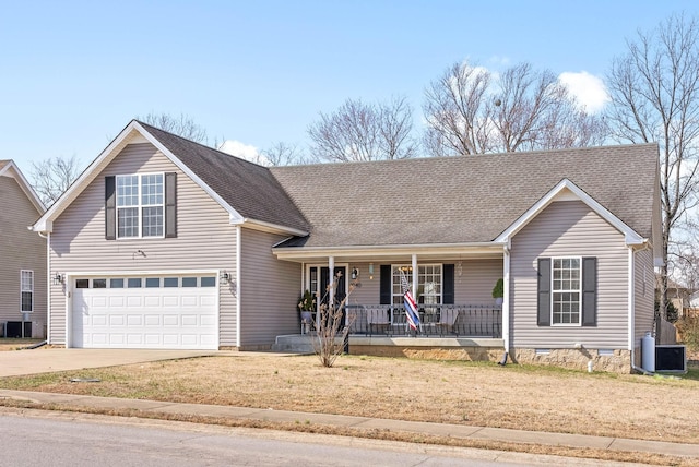 traditional-style home with roof with shingles, covered porch, concrete driveway, crawl space, and central AC unit