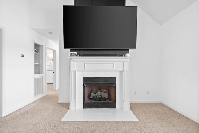 room details with a fireplace, baseboards, visible vents, and carpet floors