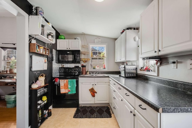 kitchen featuring white cabinets, open shelves, black appliances, and vaulted ceiling