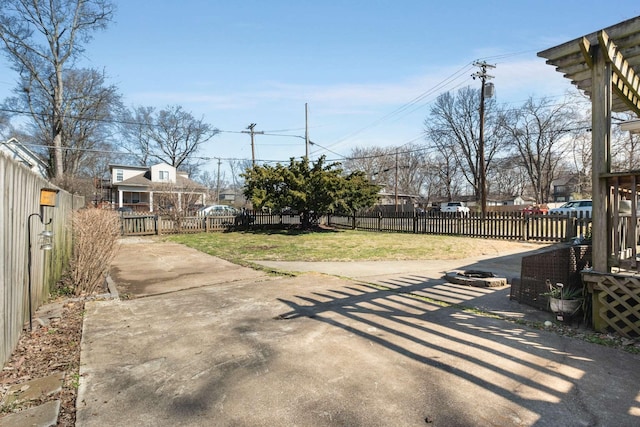 view of yard featuring a patio and a fenced backyard