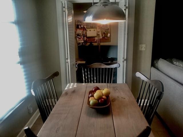 dining space with plenty of natural light