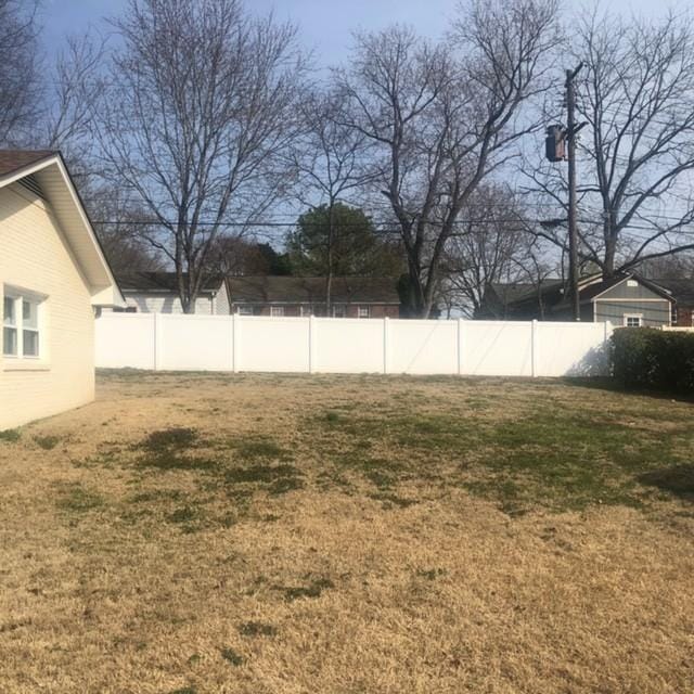 view of yard with fence