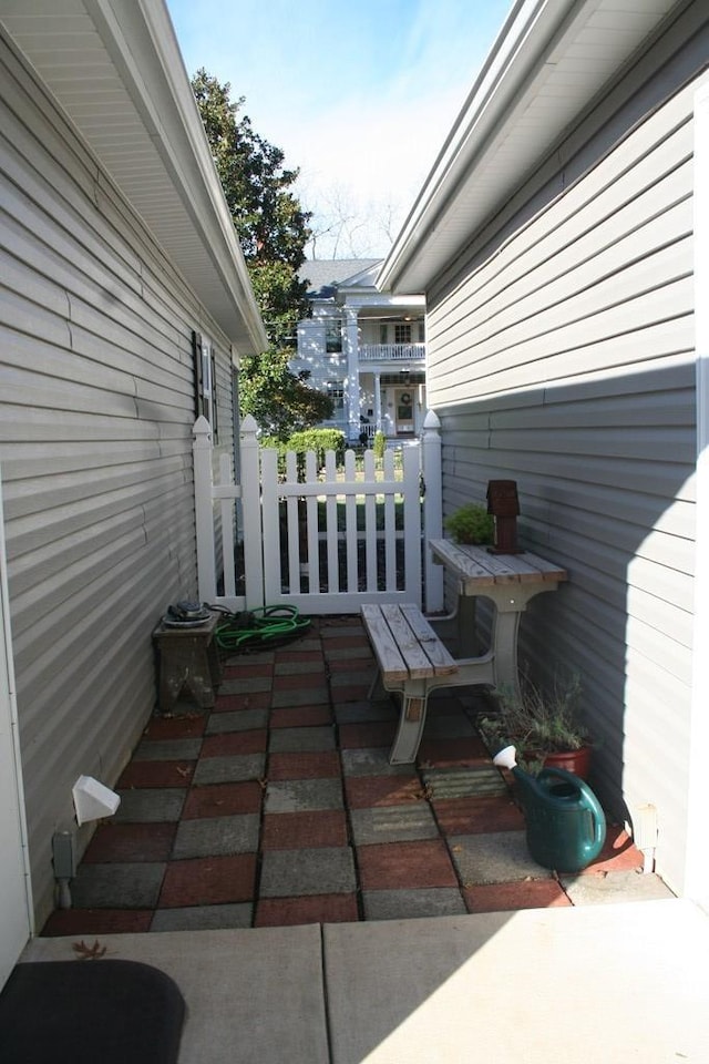 view of patio / terrace featuring a gate