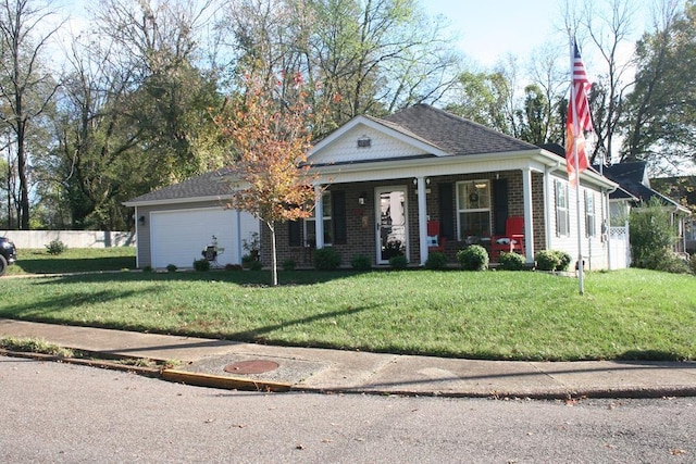 view of front of property with brick siding, a porch, an attached garage, and a front lawn