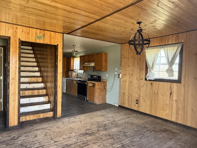 kitchen featuring wooden walls, under cabinet range hood, electric range oven, wooden ceiling, and dark wood-style flooring