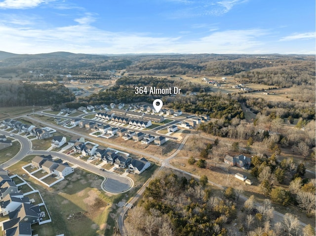 drone / aerial view with a mountain view and a residential view