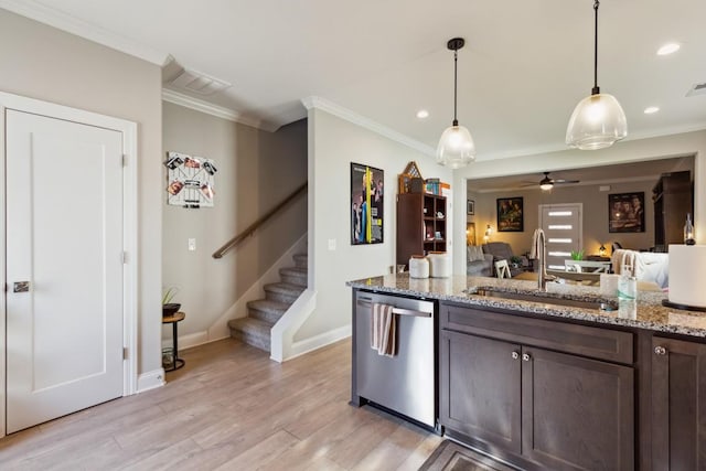 kitchen featuring light wood finished floors, dark brown cabinetry, ornamental molding, stainless steel dishwasher, and a sink