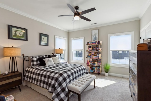 bedroom featuring baseboards, visible vents, ceiling fan, ornamental molding, and light carpet