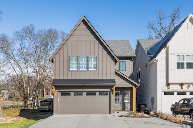 view of front of house with board and batten siding, an attached garage, driveway, and a shingled roof