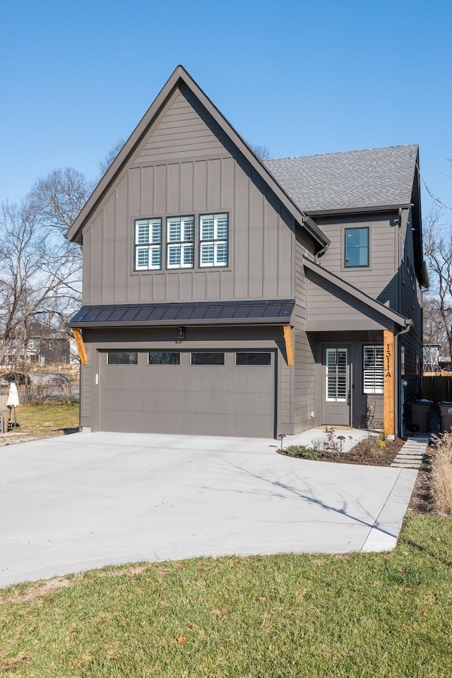 view of front of property featuring a garage, board and batten siding, concrete driveway, and a shingled roof