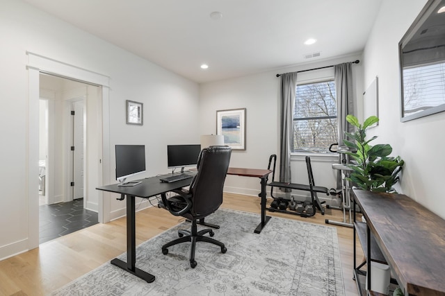 office area featuring recessed lighting, wood finished floors, visible vents, and baseboards