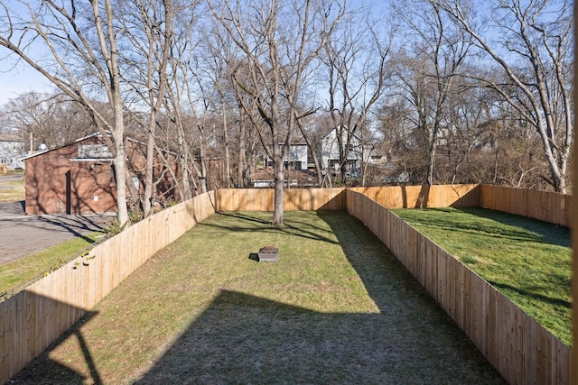 view of yard featuring a fenced backyard