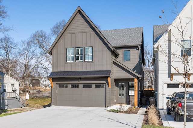 view of front of house with a garage, driveway, board and batten siding, and roof with shingles