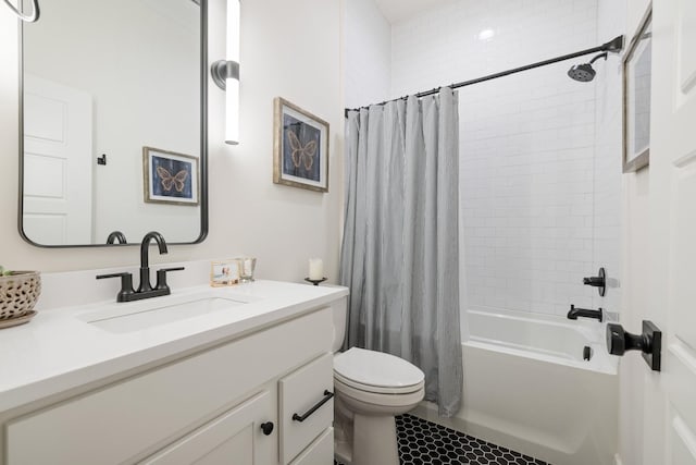 full bathroom featuring toilet, vanity, and shower / tub combo