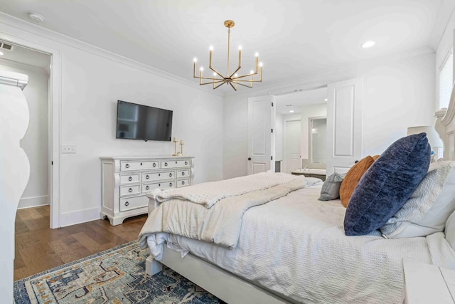 bedroom featuring visible vents, dark wood-type flooring, baseboards, ornamental molding, and a notable chandelier