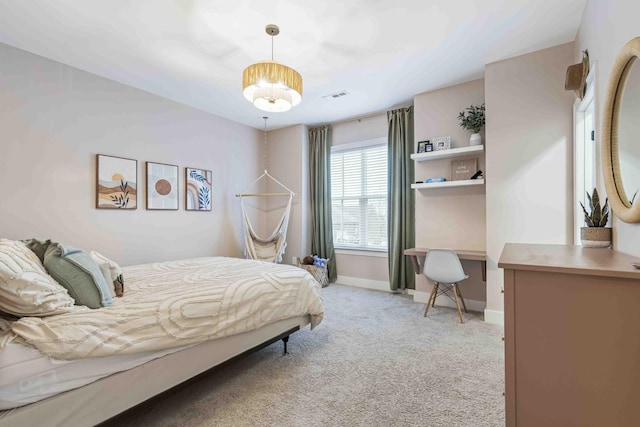 bedroom featuring light carpet, visible vents, and baseboards