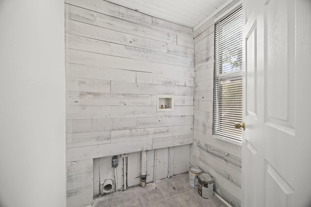 bathroom with wooden walls