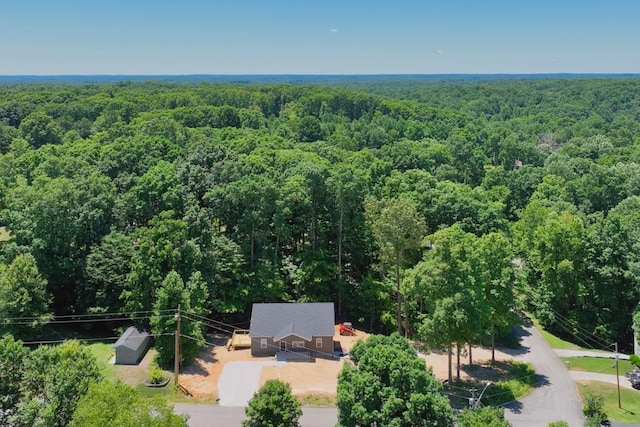 aerial view featuring a view of trees