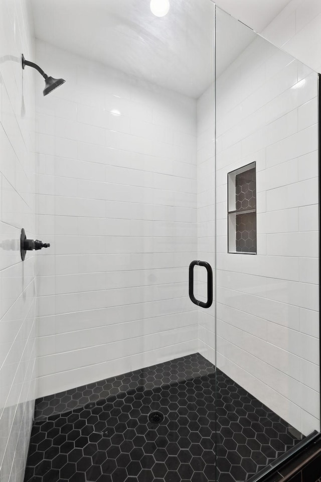 full bathroom with a shower stall