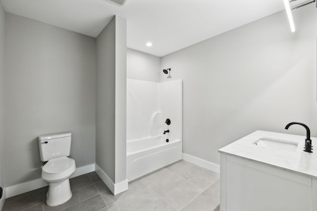 bathroom featuring tile patterned floors, bathtub / shower combination, toilet, and baseboards