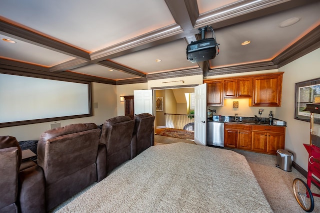 carpeted cinema room with baseboards, coffered ceiling, recessed lighting, ornamental molding, and beamed ceiling