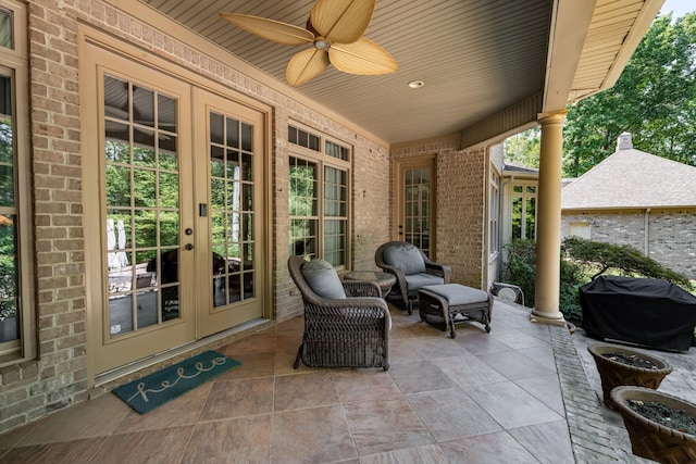 view of patio / terrace featuring french doors, area for grilling, and a ceiling fan