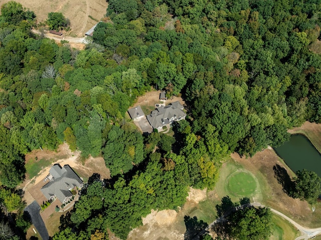 drone / aerial view with a view of trees