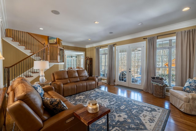 living room featuring stairs, ornamental molding, recessed lighting, french doors, and wood-type flooring