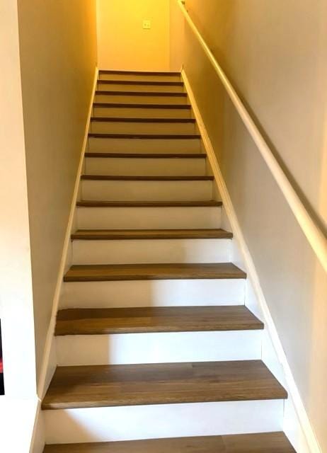 stairway with baseboards