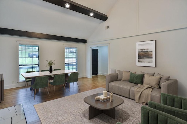2616 Mountain Laurel Dr, Antioch, TN 37013 - living room with light wood-style flooring, baseboards, beam ceiling, and high vaulted ceiling