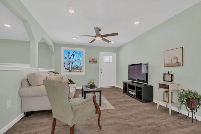 living area featuring recessed lighting, baseboards, wood finished floors, and a ceiling fan