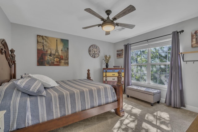 bedroom featuring visible vents, baseboards, and a ceiling fan