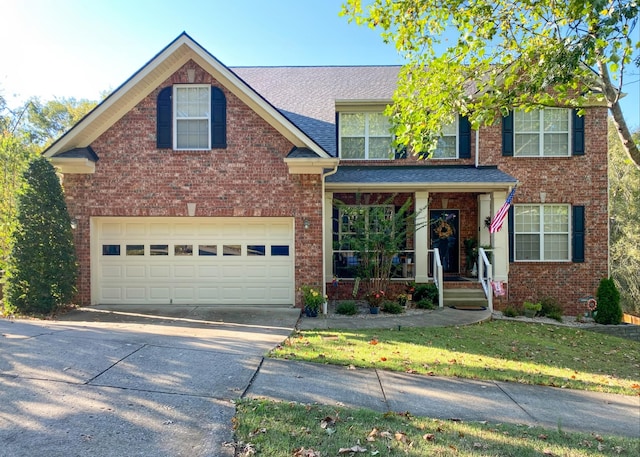 view of front of house featuring driveway, covered porch, roof with shingles, a garage, and brick siding