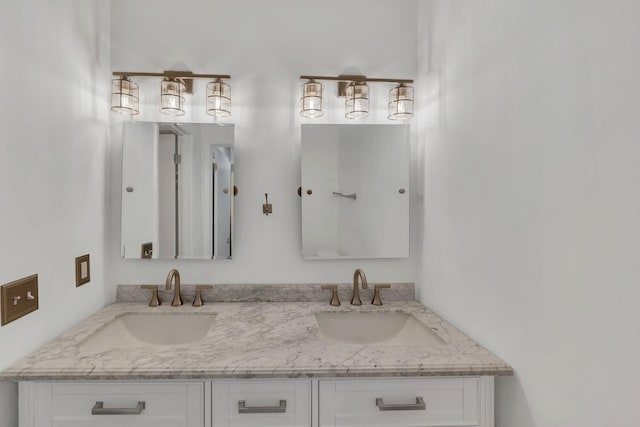 bathroom with double vanity and a sink