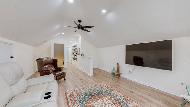 living room featuring lofted ceiling, a ceiling fan, wood finished floors, recessed lighting, and baseboards