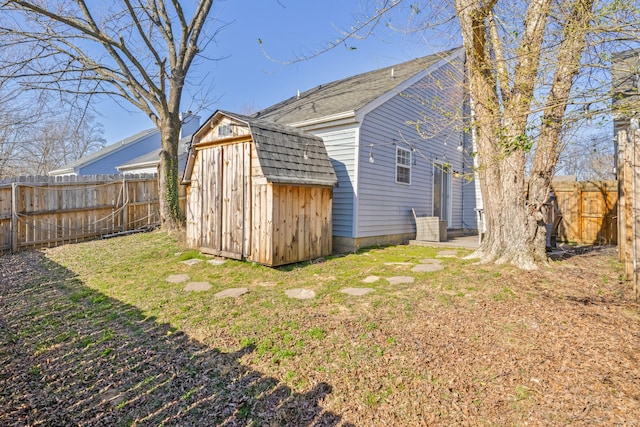 exterior space with a fenced backyard