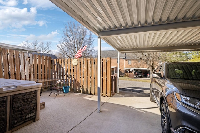 view of patio featuring fence